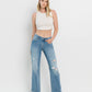 HIGH RISE DISTRESSED SLIM WIDE JEANS